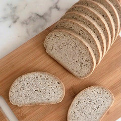 Gluten Free Sliced Bread on a Wooden Board